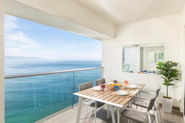 Designer 1BR Beachfront Retreat – Wake Up to the Waves