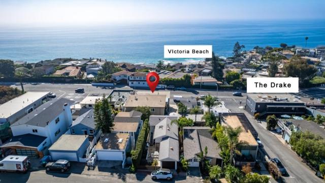 Penthouse Steps from Victoria Beach 180 degree ocean views