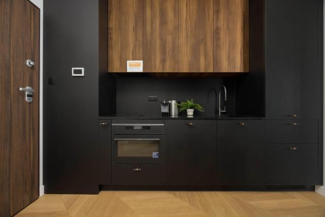 Modern Studio in Wola with Air Conditioning by Noclegi Renters