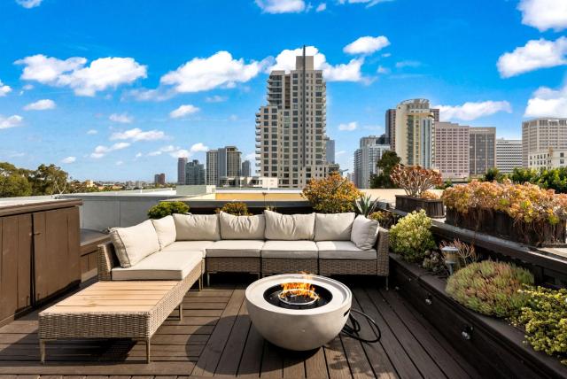 City Lights and Rooftop Nights by Rather Be Properties