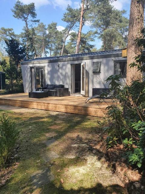 Sfeervolle woodlodge op 5 sterren vakantiepark