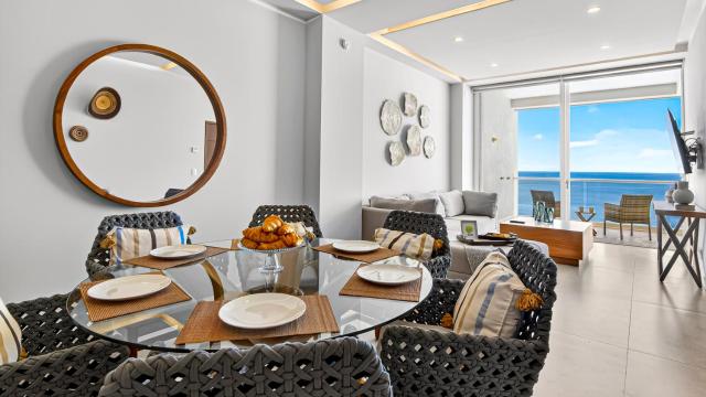 Beachfront 2BR Condo - Resort Pools & Scenic Balcony Views