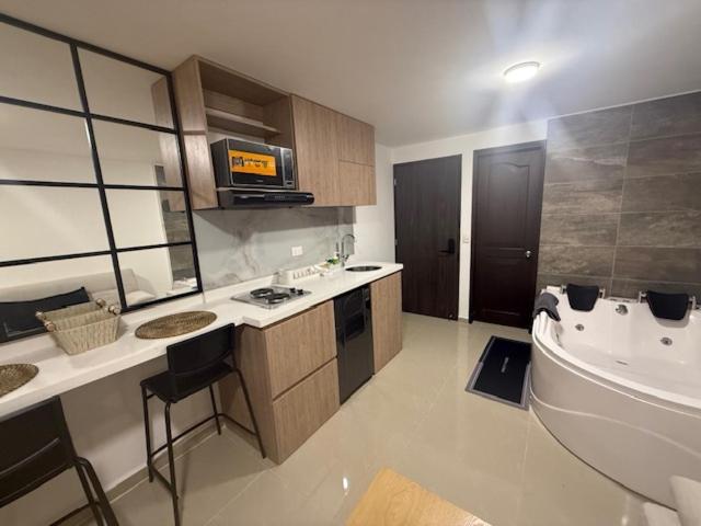 Apto con Jacuzzi Privado y Cama Doble
