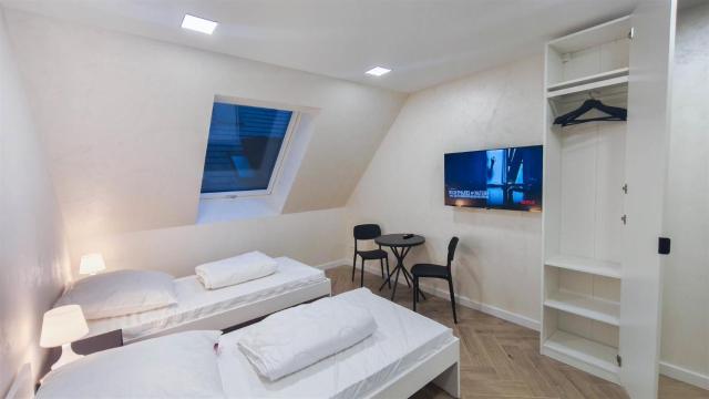 ALFA Stuttgart Doppelzimmer Teeküche Porsche Bosch l Gemeinschaftsbad WIFI SmartTV l Double room with kitchenette and shared bathroom BS21A7
