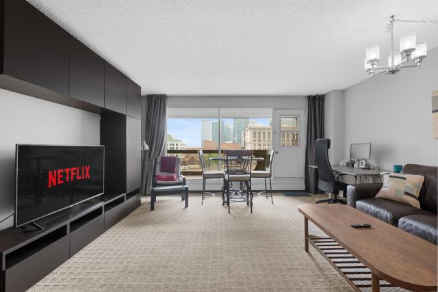 Central Downtown at Rocky Mountain Court with Gym, Court, Sauna and Secured Parking