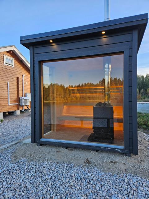 Newly built log cabin on a lakeside plot near Hultsfred