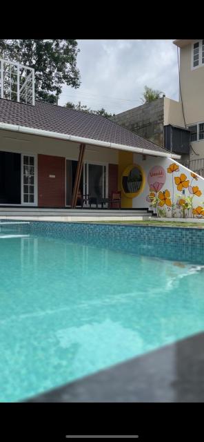 The VARANDAH LOUNGE 2BHK PRIVATE POOL VILLA VAGAMON
