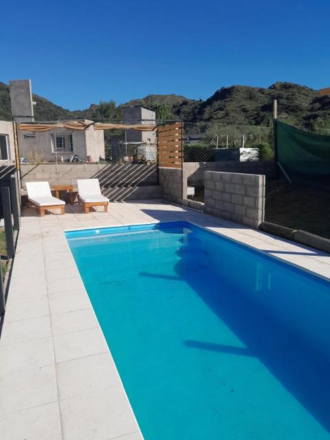 Casa con piscina y vistas a las sierras en Potrero de los Funes- Casa Sawa
