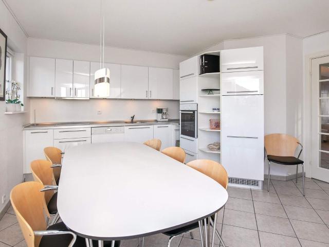 8 person holiday home on a holiday park in Bogense