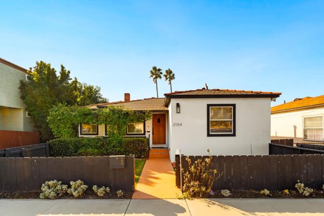 Little Italy Home with Parking and Backyard