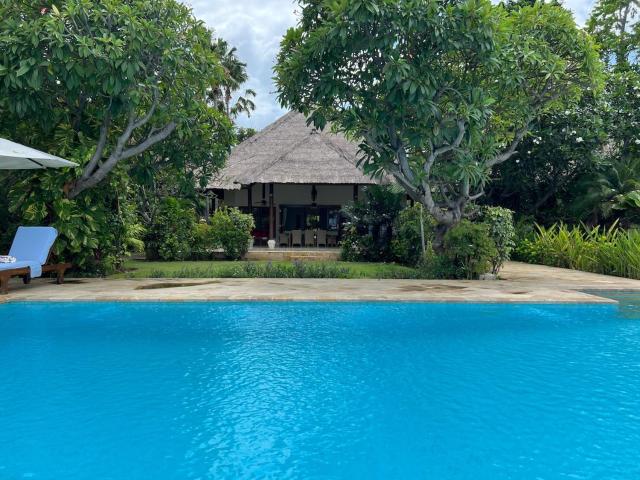 Beachfront Villa Mawar with Private Pool and Sunset View