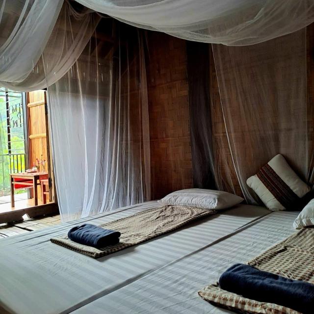 Muong Bi Homestay - a wooden stilt house owned by Uncle Lon in Luy Ai village