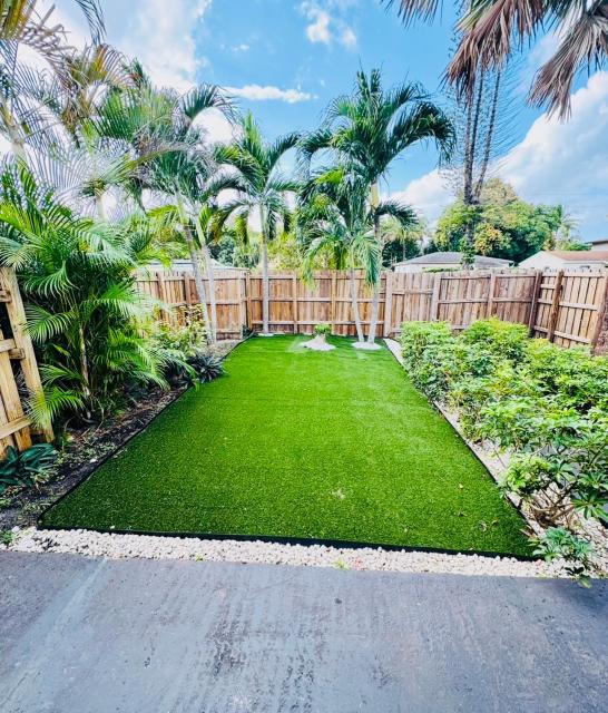 Modern Boho 3BR Duplex Escape with Pool & King Bed Near Beach