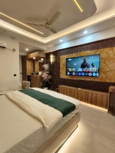 Cozycostays 65Inch TV Omaxe hazratganj