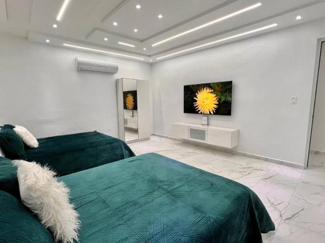 Steps from the beach Minutes from SJU Heated pool