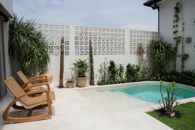 Peaceful 2BR home with pool and garden