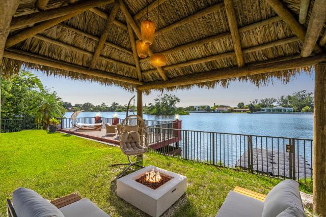 Waterfront Jungle House Firepit Sunset and more