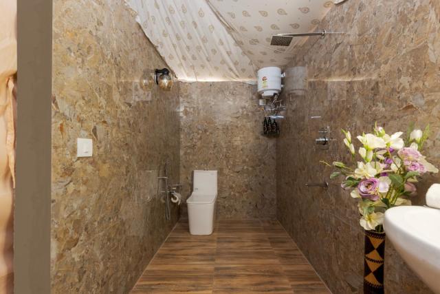 SaffronStays Raj Reverie Maharaja Tent Suites