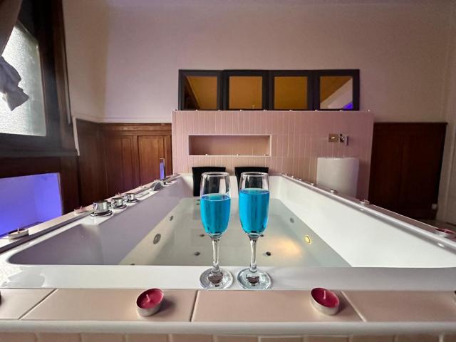 Pink Love Room privée avec jacuzzi privatif