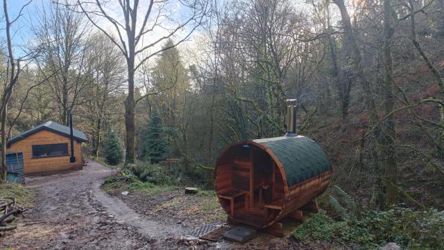 Stream-side cabin and sauna