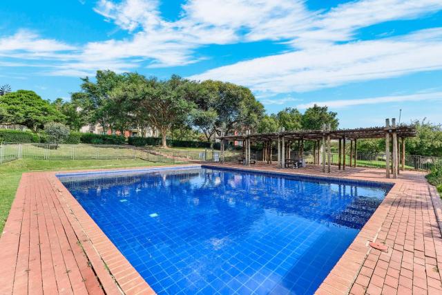 Golf Estate Apartment with Garden Views and Work-Friendly