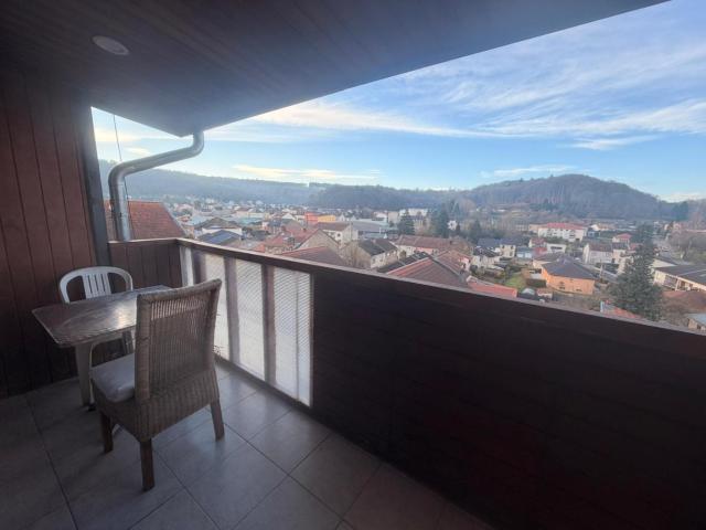 Chambre avec balcon offrant une vue magnifique