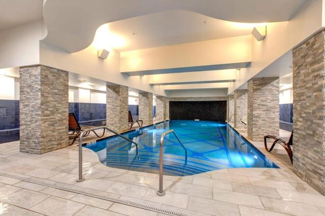 ski-in ski-out Condo with Shared Hot Tubs & Pool High-Speed WiFi and Central AC