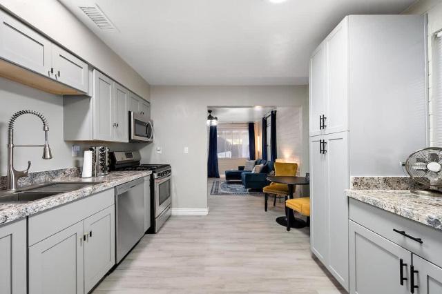 Chic 2BR Getaway with BBQ & EV Charger Sleeps 4