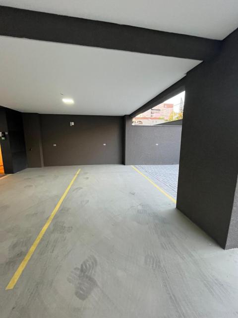 Studio novo, a 150 metros da Vila Germanica com garagem coberta