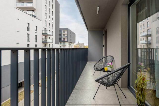 Klimatyczny Apartament z Parkingiem przy Manufakturze w Łodzi by Noclegi Renters
