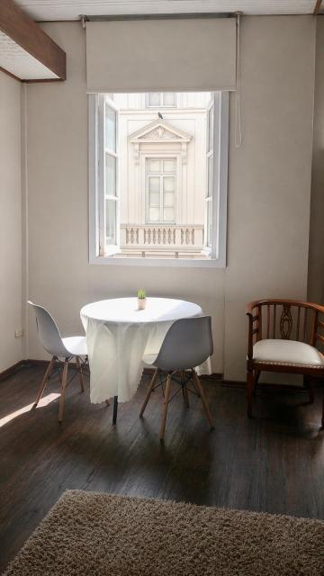 Habitación con balcón con vista al corazón de la ciudad