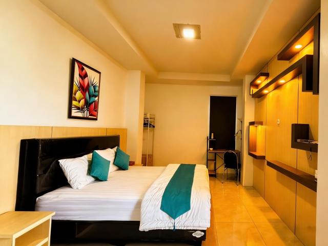 De BOUGENVILLE Tulap Beach Front