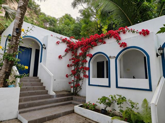 De BOUGENVILLE Tulap Beach Front