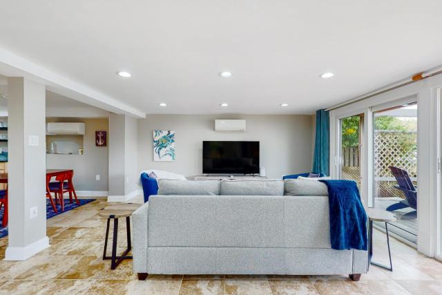 Serene waterfront home with kayaks, paddle board, grill, firepit, WD, and AC