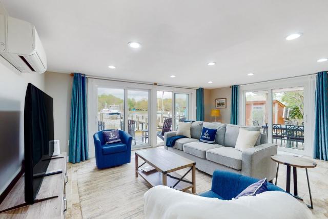 Serene waterfront home with kayaks, paddle board, grill, firepit, WD, and AC