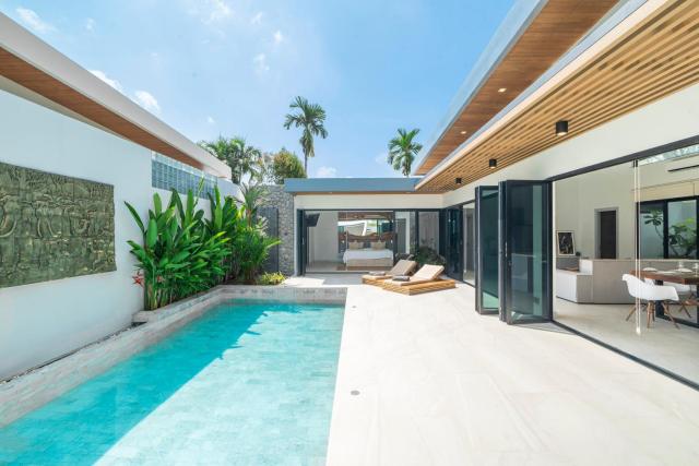 Private Pool Villa 4BR Bangtao and Layan Beach in Cheong Thalea, Phuket