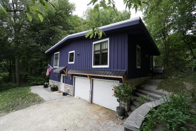 Wooded Riverside Retreat