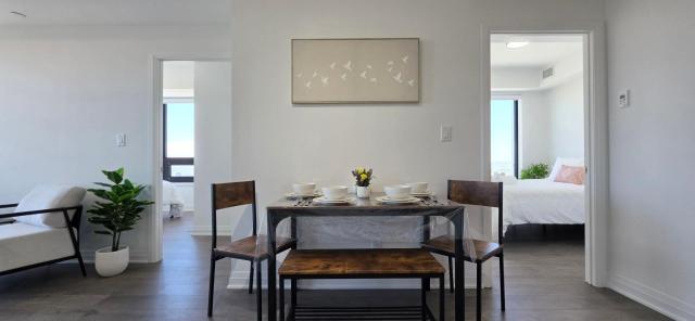 Sky High Luxe Stay 2BR-2BA Near Square One With Lake View, Gym, Pool & Parking