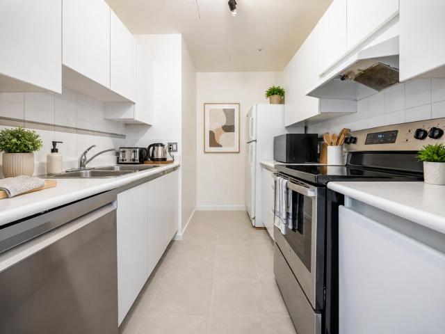 Central 2BR Stay Steps from Stadium, Shops and Restaurants