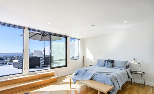 Three Bedroom Residence with Private Rooftop Deck