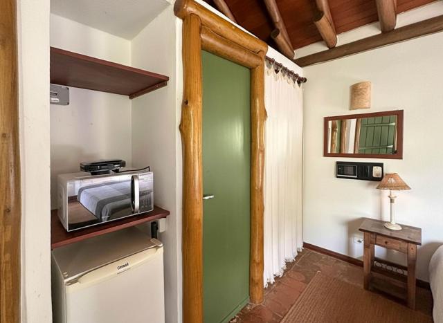 Chalé aconchegante c/ lareira, sauna e piscina.