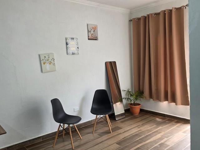 Room in a residential complex across from the airport