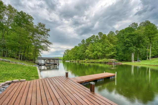 Sprawling waterfront home with kayaks, game room, and hot tub