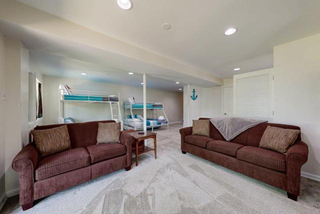 Lakefront Escape with Private Docks, Three-Season Room, and Spacious Bunk Room