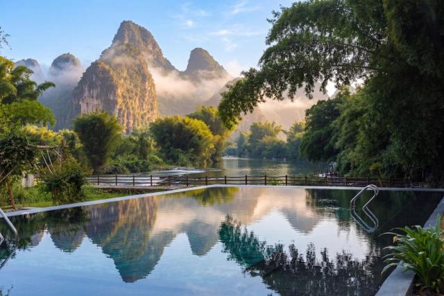 L'Eau Vive de Qixi Meidi - Riverfront Infinity Pool & Log Cabin Cafe - Outdoor Cooking Class - English Speaking Service - E-Bike Tours - Complimentary Shuttle within 8 Kilometers