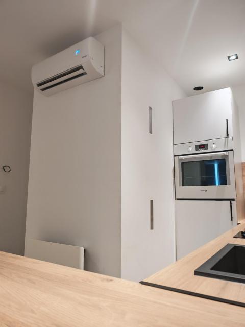 L'immeuble du Monde Rose - Appartements neufs climatisés - classés 3 étoiles - Vic le Comte - Auvergne