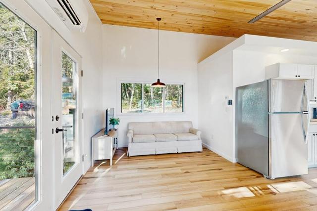 Modern Maine cottage with river views, deck, and a convenient washer/dryer
