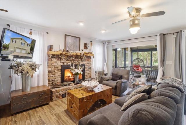 Riverfront Cabin w Screened Patio and Fire Pit