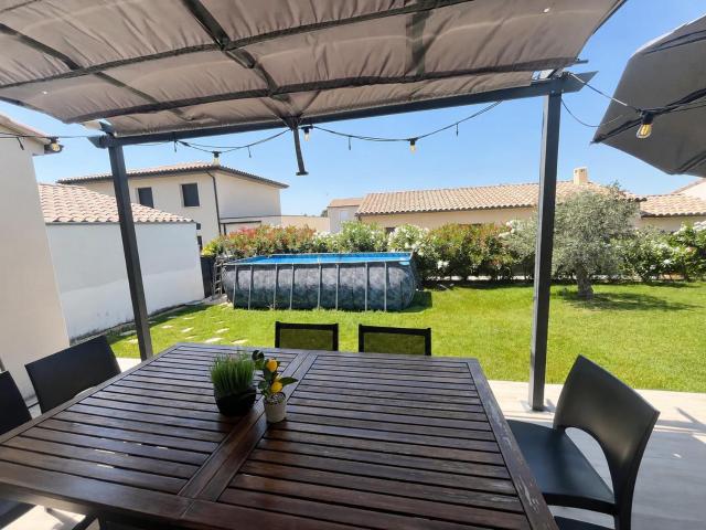 Villa la belle étape- Joli jardin avec piscine hors sol, climatisation et barbecue