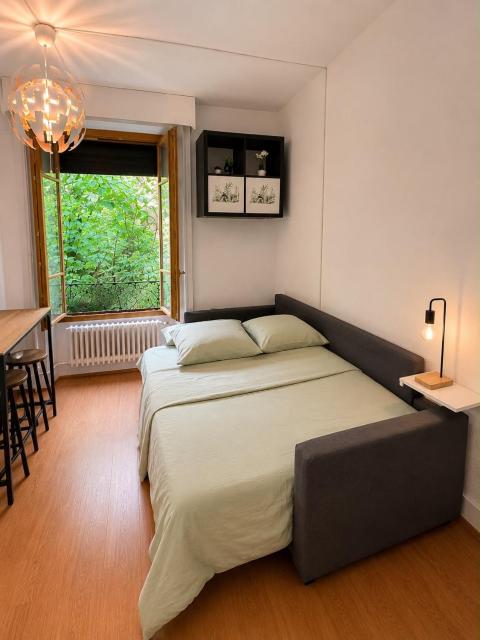 Studio moderne et chaleureux au coeur de Geneve - parfait pour courts sejours
